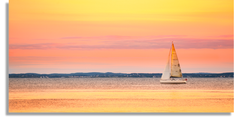 Sailing in the Sea at Sunset