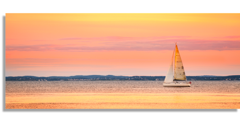 Sailing in the Sea at Sunset